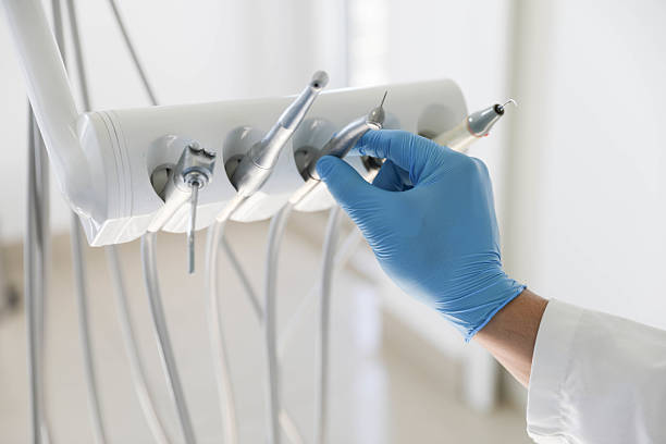 Professional Tooth Extraction technician working in Morehead City, NC